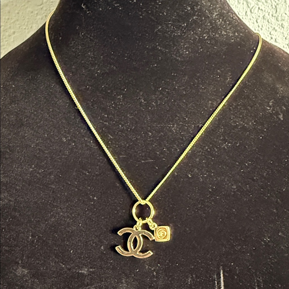 CHANEL Gold Necklace with Iconic Logo Pendant